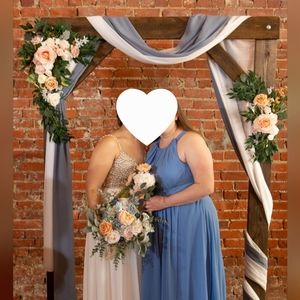 Blue and peach wedding Arch flowers and drape
